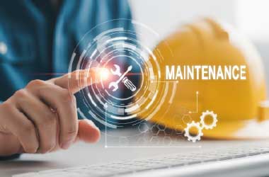 Ecommerce website maintenance and content updates concept showing laptop, gears, and progress dashboard.